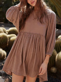 Textured Babydoll Mini Dress with Back Keyhole Detail DJPT