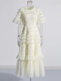Elegant Dress 2025 Spring New Round Neck Pressure Folding Mesh Splicing Wave Point Cake Skirt