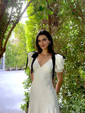 Gentle Temperament Ken Bean The Same Spring 2024 White Deep V Bow Tidial Sleeve Dress