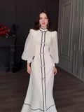 2024 New Bow Decoration Black And White Splicing Temperament Half-High Collar Long Dress