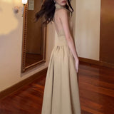 Fashion Temperament In The Fall Of 2024, The Back Of The Solid Color Dress