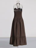 Temperament Gentle Wind 2025 Summer New Splicing Convex Flowers Decorated Hanging Neck Silk Dress Woman